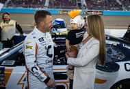 AJ Allmendinger with wife Tara Allmendinger and son Aero Allmendinger during the Championship race at Phoenix Raceway. Mandatory Credit: Mark J. Rebilas-Imagn Images